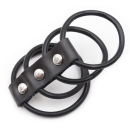 Четыре эрекционных кольца из силикона на кожаном ремешке