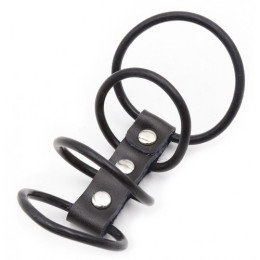 Четыре эрекционных кольца из силикона на кожаном ремешке