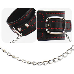 Узкие наручники черного цвета с красной нитью