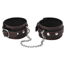 Узкие наручники черного цвета с красной нитью